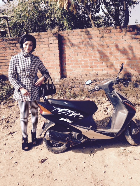 Jennifer drove us to her school on her motorcycle